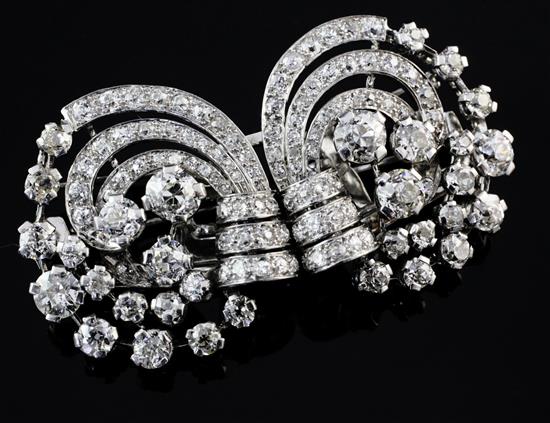 A 1930s/1940s platinum and diamond set double clip brooch, 2.25in.